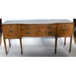 A 19th century mahogany break front sideboard, fitted with two drawers flanked by cupboards, all