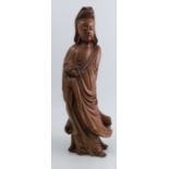 A Chinese carved hardwood figure, of Guanyin, height 19ins