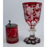 A 19th century Bohemian ruby overlay goblet, engraved with vines, af, height 10.75ins, together with