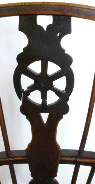 An Antique Windsor armchair, with wheel splat back, raised on turned legs with H stretcher - Image 2 of 3