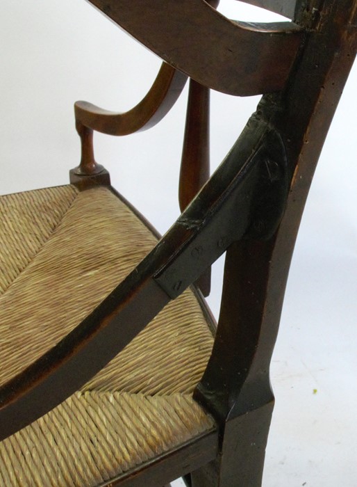 An Antique beech open arm chair, with shield shape back, having a rush seat with turned - Image 6 of 6