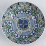 A Chinese dish, decorated with in the famille verte palate, bearing a label to the base, Kitchener