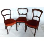 A matched set of eight 19th century mahogany balloon back chairs, some with carved decoration, all