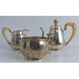 A 19th century Continental silver three piece coffee set, the coffee pot, sugar bowl and milk jug