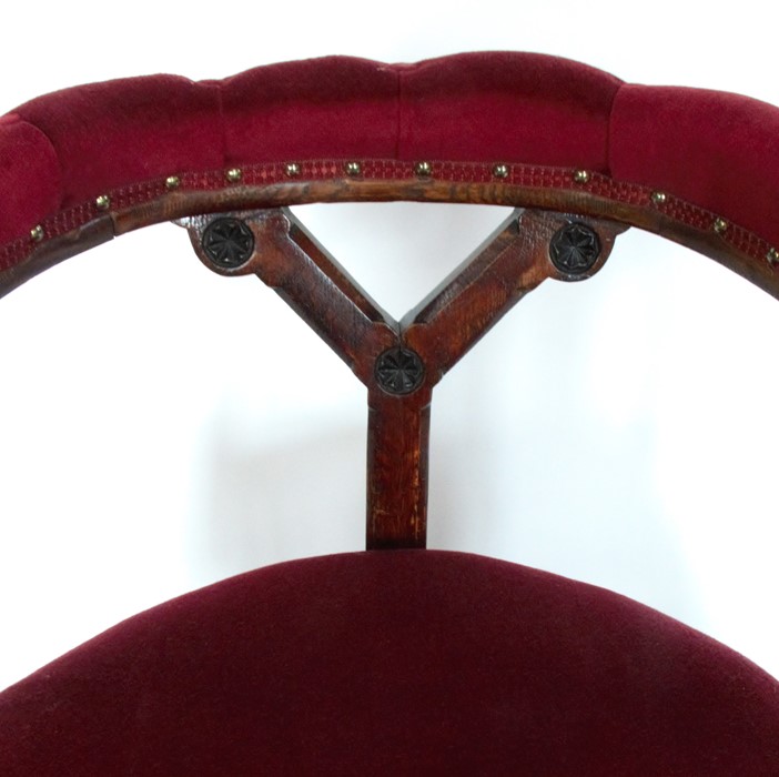 A Victorian oak and upholstered Gothic style chair, with curved back rail and Gothic style supports - Image 2 of 3