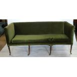 A late 19th century upholstered settee, raised on four turned mahogany front legs, length 74ins,
