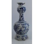 A large Delft vase, decorated in underglazed blue and white with birds and foliage, badly damaged,