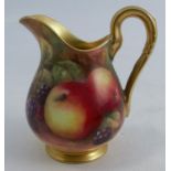 A Royal Worcester jug, decorated with fruit to a mossy background by H H Price, height 3insCondition