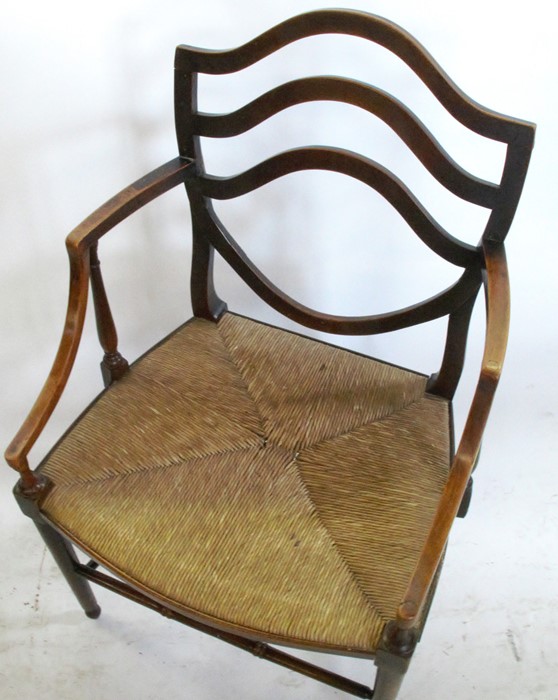 An Antique beech open arm chair, with shield shape back, having a rush seat with turned - Image 4 of 6