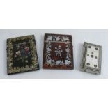 A 19th century tortoiseshell and mother of pearl inlaid card case, decorated with flowers,
