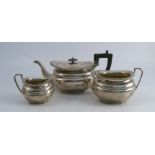 A silver three piece tea set, with gadrooned edge, Sheffield 1924, weight 43oz all in