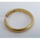 A 22 carat gold plain wedding ring, af, 3.6g gross