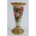 A Royal Worcester vase, decorated with pink roses, to a gilt embossed stepped foot, shape number