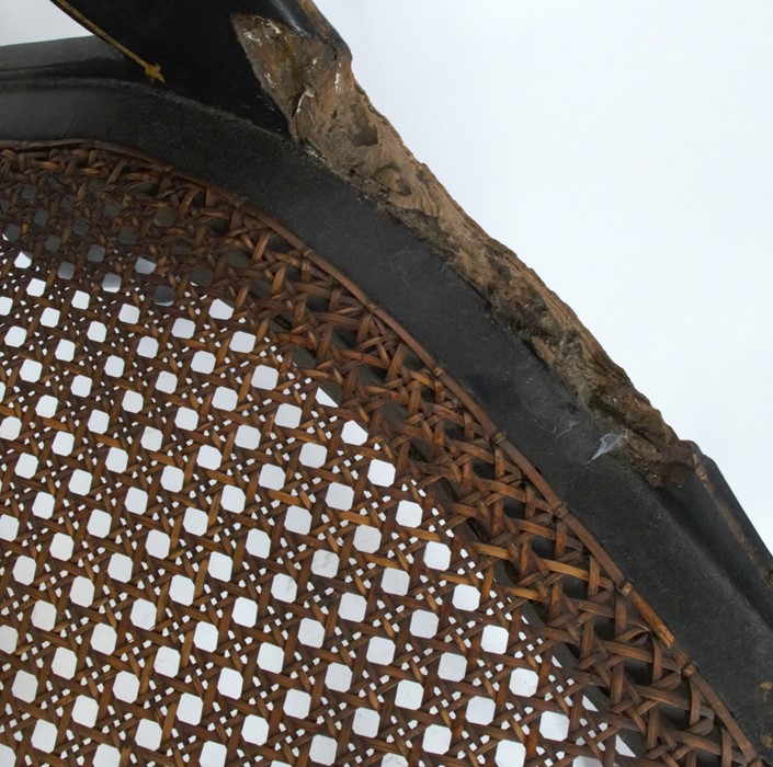 A Victorian black papier mache chair, with gilt decoration to the black ground, having a cane - Image 4 of 4