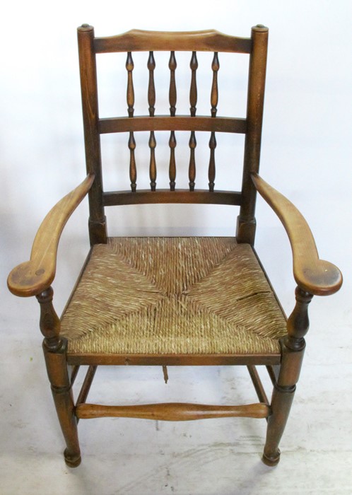 An Antique beech open arm chair, with shield shape back, having a rush seat with turned - Image 2 of 6
