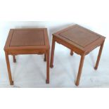 A pair of Oriental square tables, with carved decoration to the frieze, 18ins x 18ins x 20ins