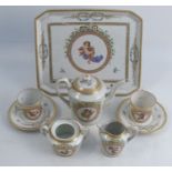 A continental porcelain cabaret set, comprising a tray, two coffee cans and saucers, coffee pot,