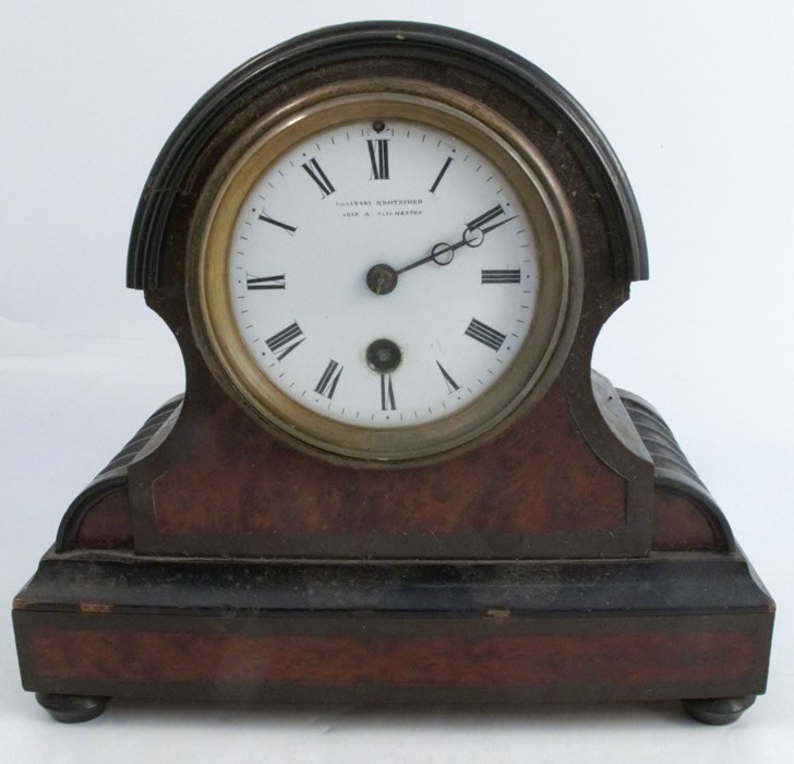 A 19th century mantel clock, with ebonised and burr wood case, the enamel dial inscribed