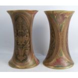 A pair of Doulton Burslem Art Ware vases, of waisted cylindrical form, decorated in gold on brown