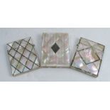A 19th century mother of pearl note card holder, with silver plaque to the front, together with