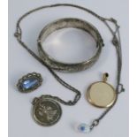 A 9 carat gold picture pendant; a silver hinged bangle; a Murrle Bennett & Co paste set brooch;