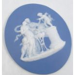 A blue jasper plaque, in the Wedgwood manner, decorated with a white relief sacrificial scene,