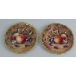 A pair of Royal Worcester side plates, decorated with fruit to a mossy background by P Love, with