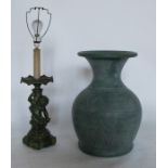 A table lamp, decorated in the shot silk style with a  holding a light, height 14.5ins, together