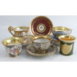 A group of continental porcelain to include three cups and saucers, two cups and a saucer, one