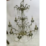 A glass and gilt metal chandelier, of tiered form with droppers, height 36ins
