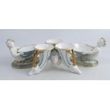 A Kerr and Binns Worcester centre piece, formed as three horns moulded as stags heads and masks,