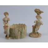 Two Royal Worcester blush ivory figures, in the Hadley style, of a boy standing by a branch, model