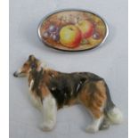 A Royal Worcester porcelain brooch, modelled as a dog, af, together with another oval brooch painted