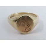 A 9 carat gold signet ring, monogrammed, finger size M1/2, 5.7g gross