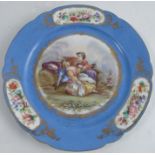 A 19th century Sevres porcelain plate, decorated with figures seated in rural setting, with