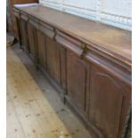 A painted pine sideboard, fitted with three pairs of short drawers to the frieze over three pairs of