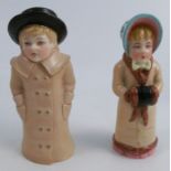 Two Royal Worcester candle snuffers, girl with a muff and boy wearing a boater, height 4insCondition