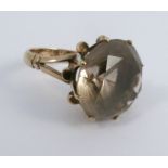 A single stone smoky quartz ring, stamped '14k', finger size O, 8.7g