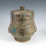 A Chinese brass covered vase, of archaic form, with cloisonne decoration and seal mark to the
