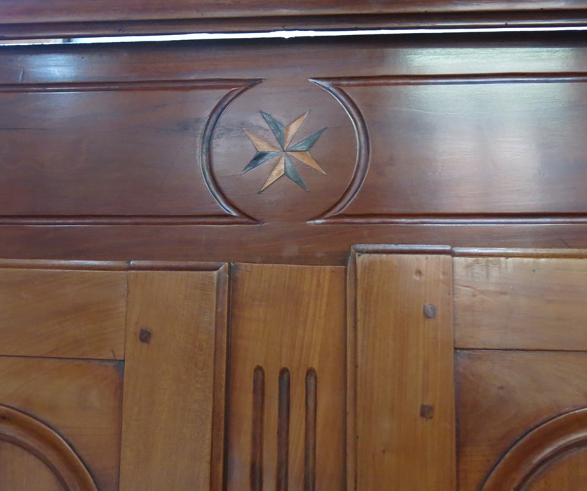 A Continental walnut inlaid armoire, fitted with doors and having inlaid star motif - Image 2 of 4