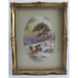 A oval porcelain plaque, decorated with five sheep in a snowy landscape by Milwyn Holloway,