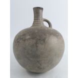 An Eastern spherical shaped bottle vase, height 10insCondition Report: chipped and cracked  at the