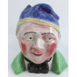 A 19th century Scottish Pottery Portobello-type character jug, of Souter Johnnie, the companion of