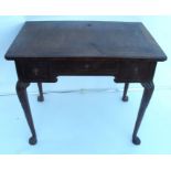 A 19th century walnut low boy, with line inlay to the top, fitted with three drawers, the legs