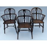 Three Antique Windsor armchairs, two in yew with an elm seat and the other in ash with elm seat, all