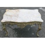 A serpentine shaped cast and pierced brass rococo style coffee table, on cabriole legs, with a