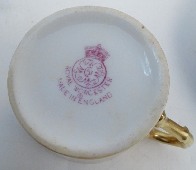 Six Royal Worcester coffee cans and saucers, decorated with fruit to a mossy background, various - Image 5 of 6