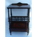 A late 19th century burr wood and ebonised Canterbury whatnot, with a shelf raised on turned