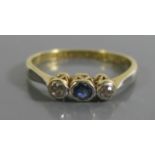 An 18ct Gold and Platinum, sapphire and Diamond Ring, size J.5, 1.7g