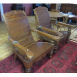 A Pair of Teak Plantation Chairs (cost £500 each)